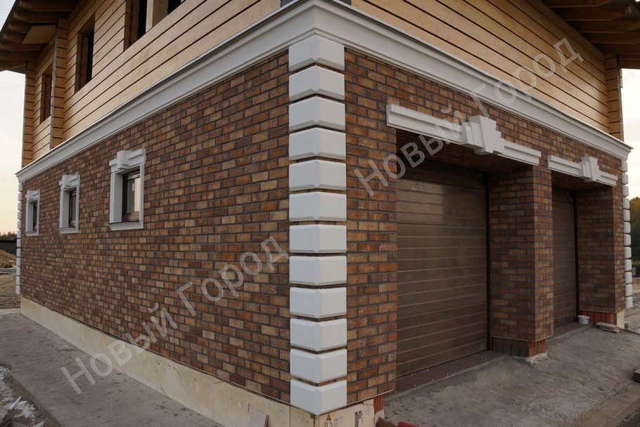 Отделка фасада плиткой под камень