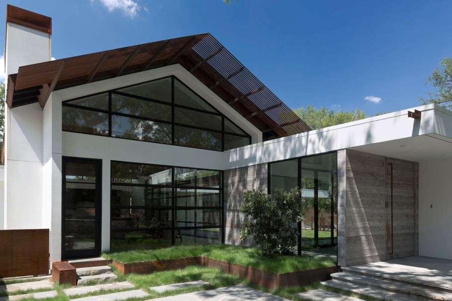 Современный г образный дом