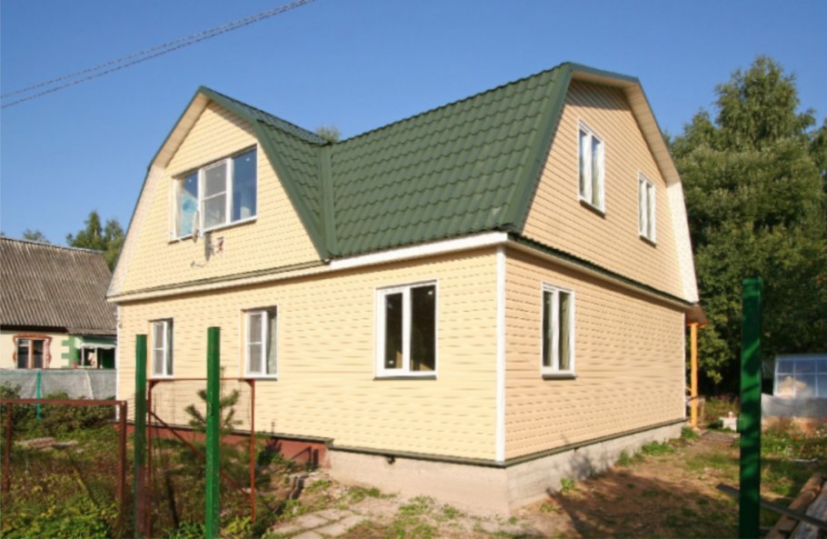 Проекты каркасных домов с ломаной крышей