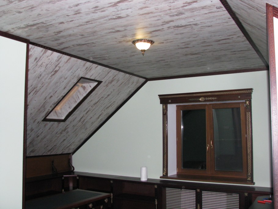 Отделка мансарды МДФ