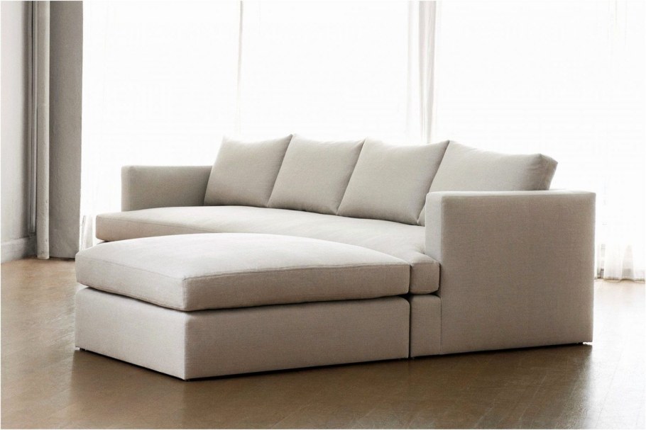 Серый диван с пуфом