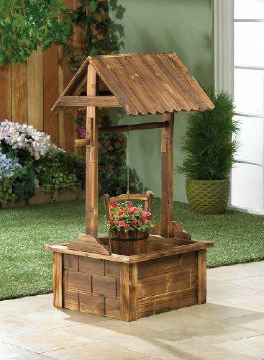 Декор бетонного кольца колодца