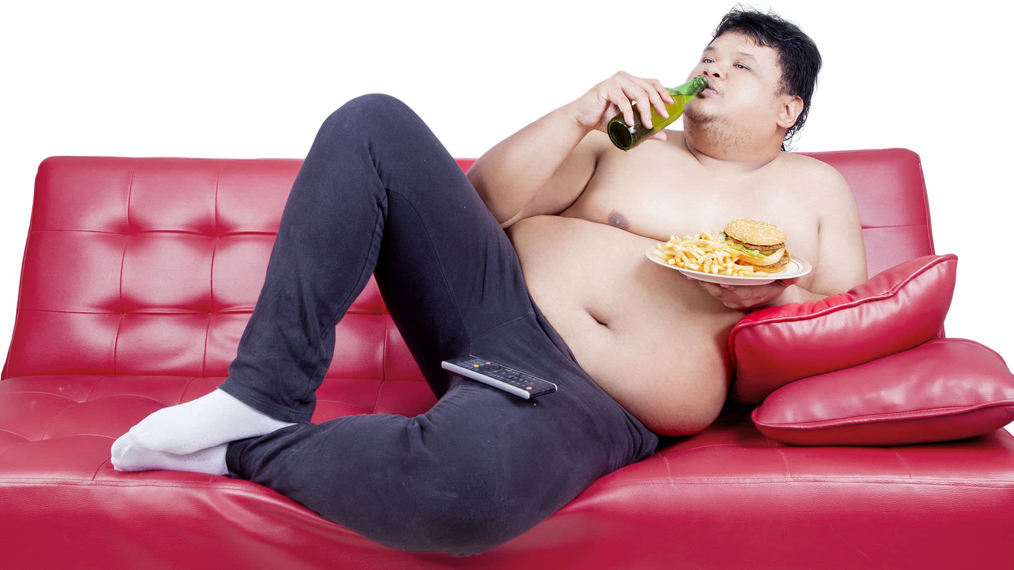 Толстый человек лежит. Толстый мужчина на диване. Толстяк лежит на диване.