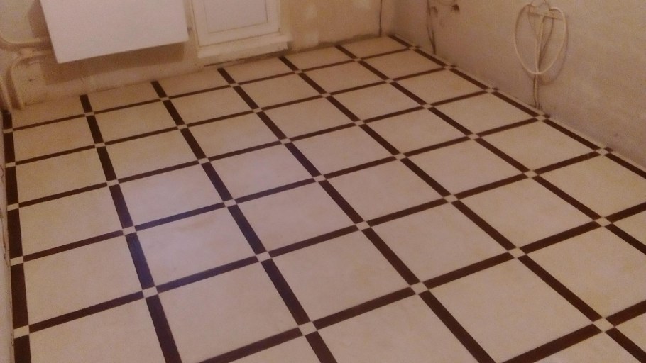 Укладка плитки для пола на кухне