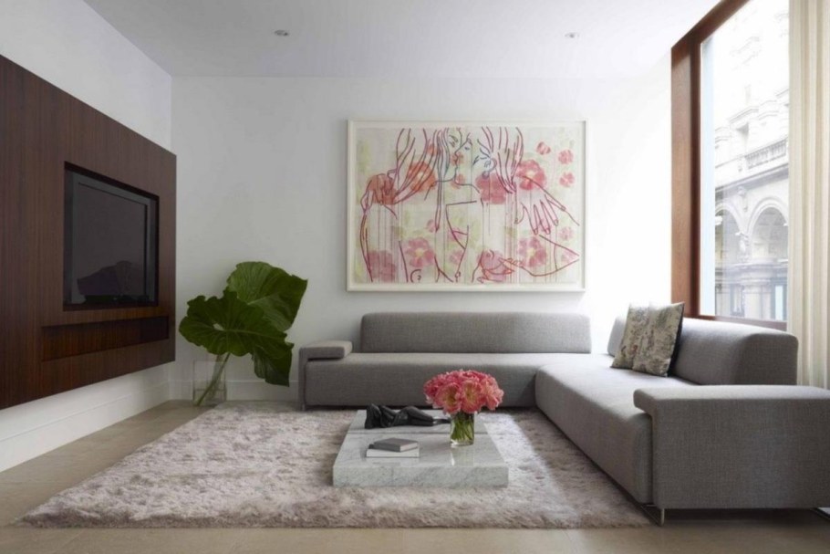 Ковры в интерьере гостиной с угловым диваном