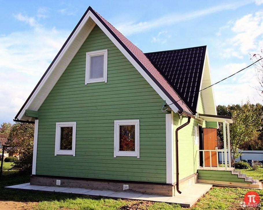 Дачный дом обшитый сайдингом