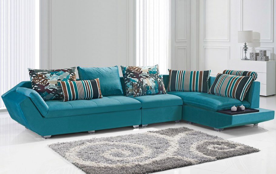Бирюзовый угловой диван в интерьере