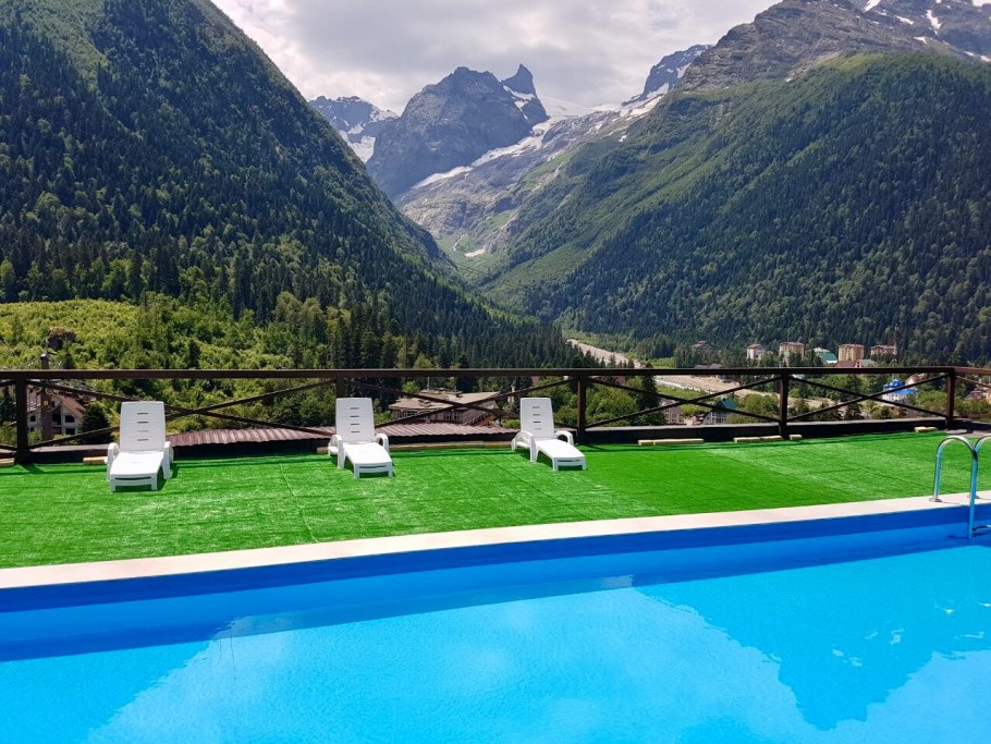 Апартаменты вершина Домбай бассейн