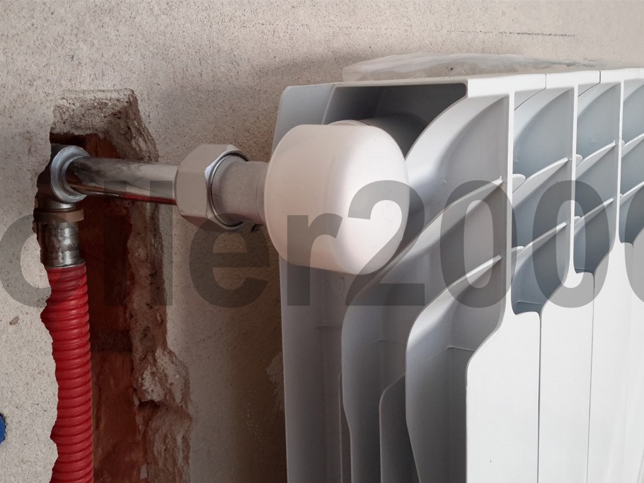 Биметаллический радиатор с трубой Uponor