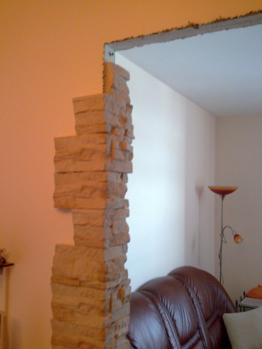 Отделка проема без двери камнем