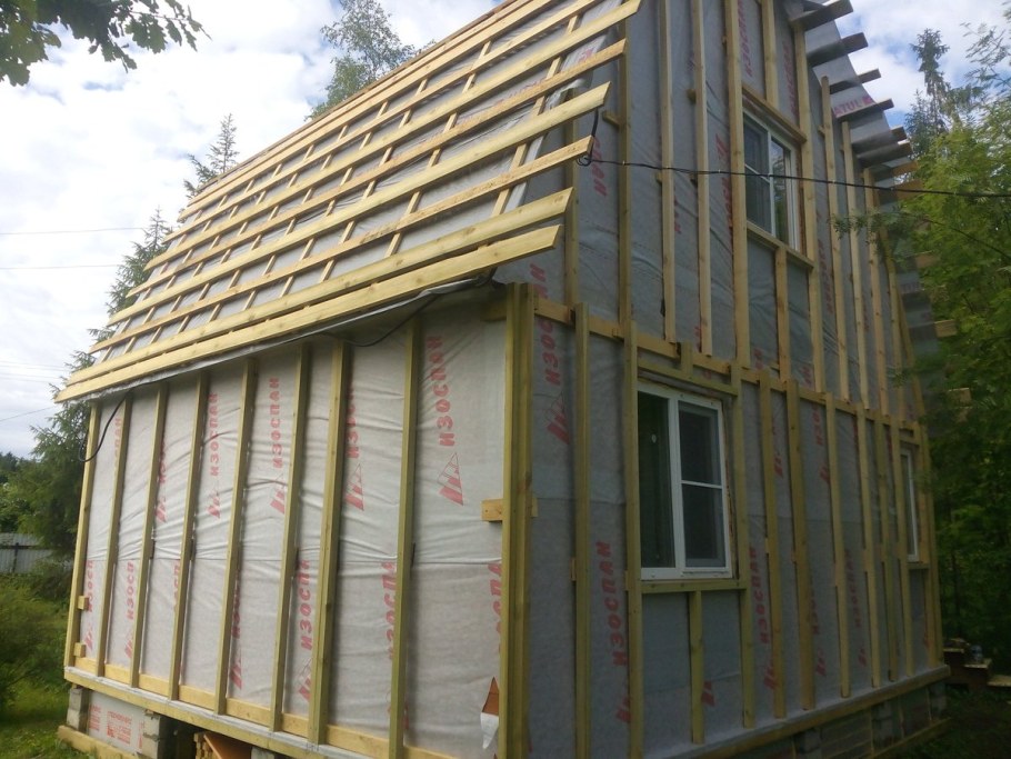Дом обшит металлосайдингом блок Хаус