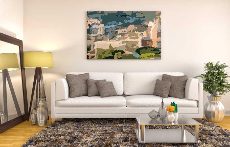 Картина над диваном в спальне