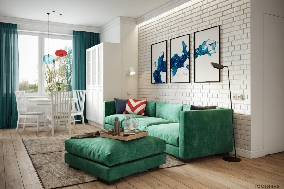 Изумрудный диван в интерьере гостиной