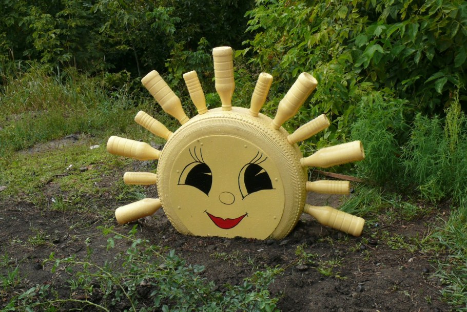 Солнце из колеса для сада