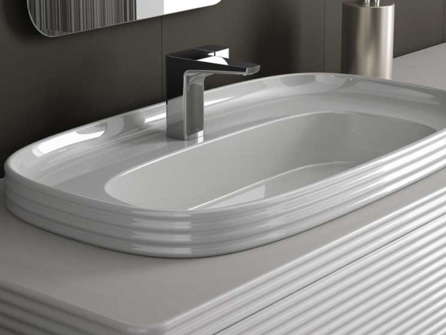 Раковина полувстраиваемая овальная