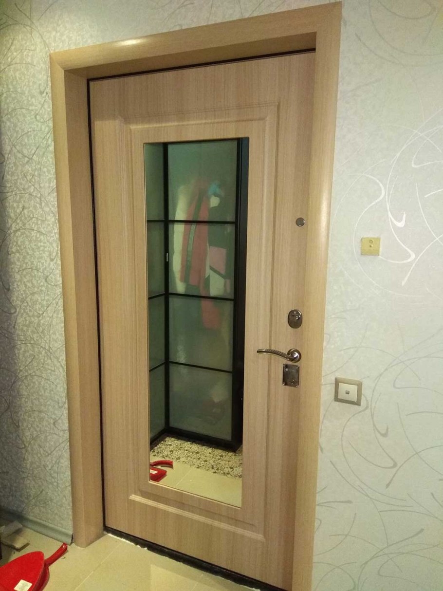 Отделка откосов входной двери изнутри МДФ