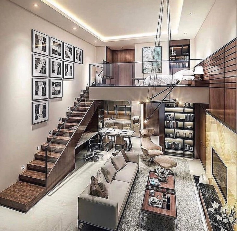 Интерьер гостиной с лестницей