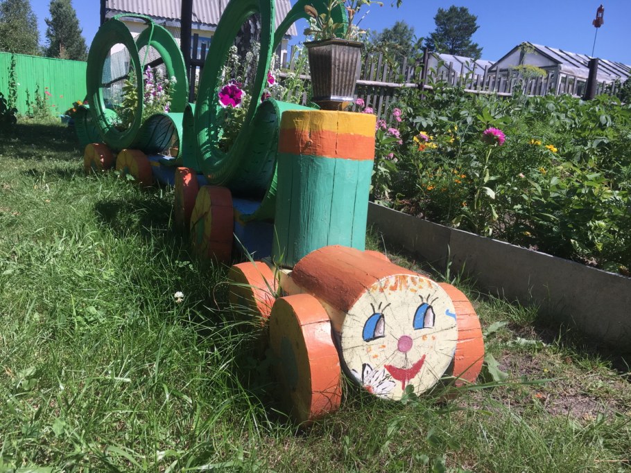 Бычок из бревна для сада