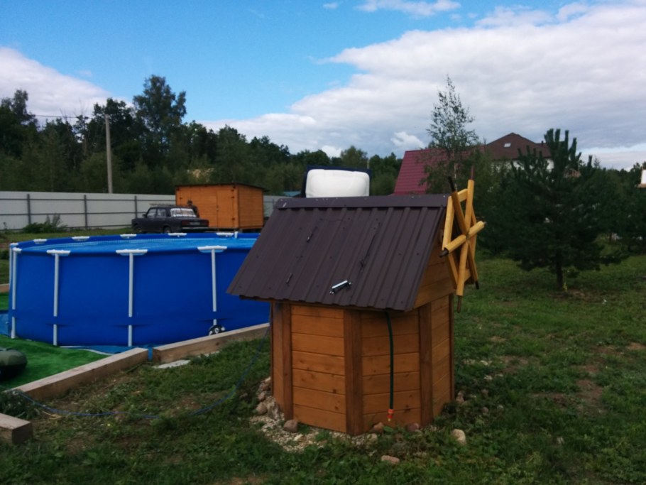 Отделка колодца сайдингом