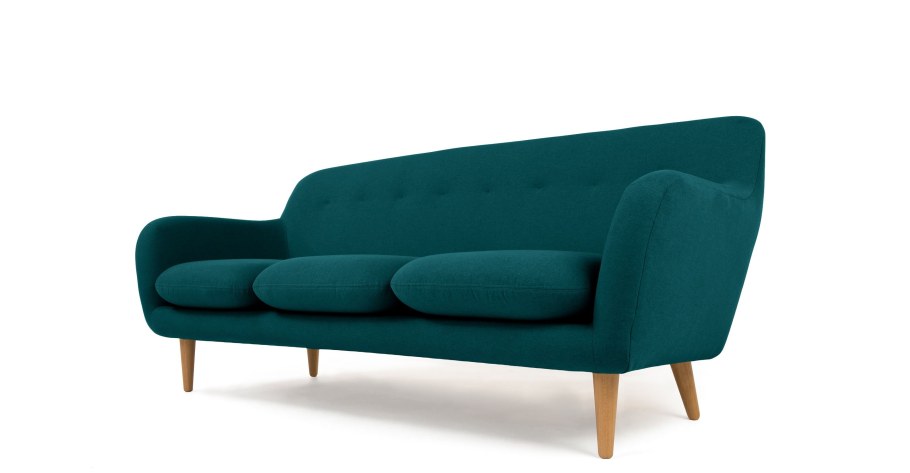 Зеленый диван на деревянных ножках