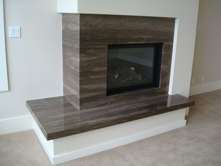 Отделка камина из мрамора