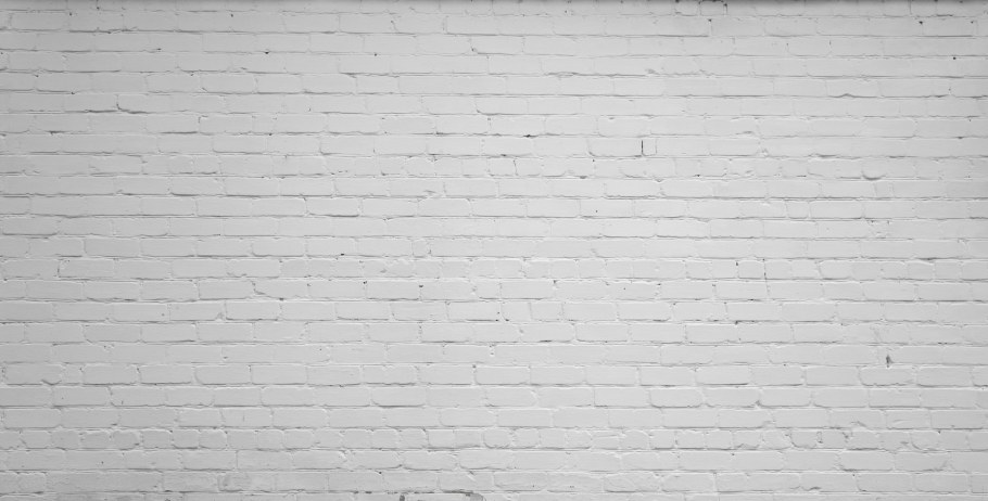Белая кирпичная стена фон
