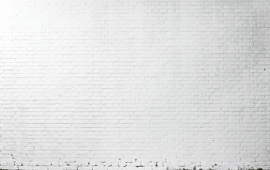 Белая кирпичная стена фон