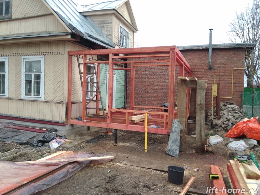 Каркасная пристройка к кирпичному зданию