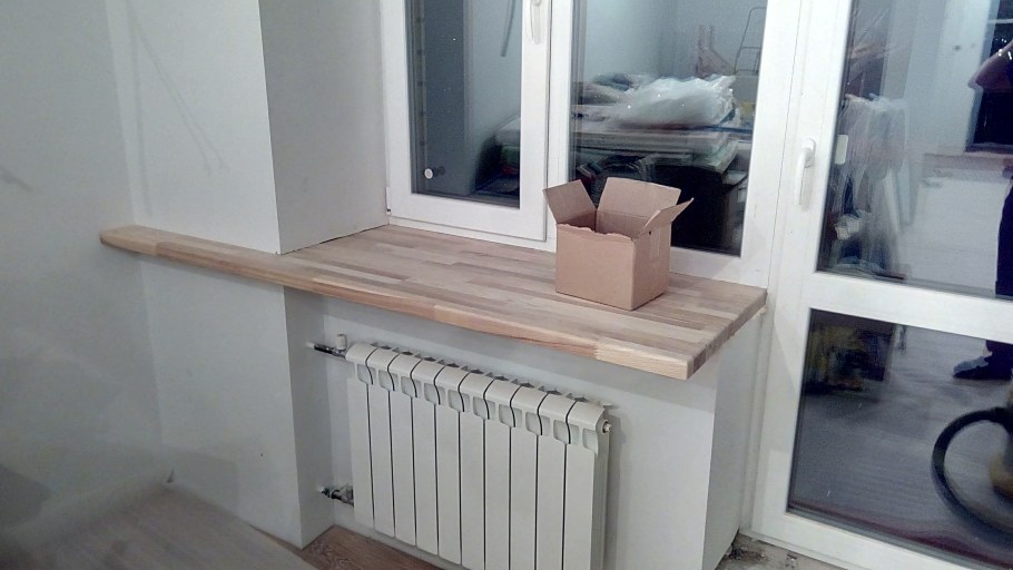 Внутрипольный конвектор в подоконнике