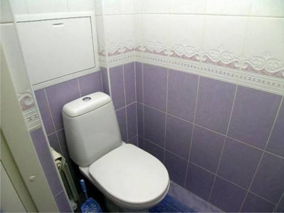 Туалет отделанный ПВХ плиткой