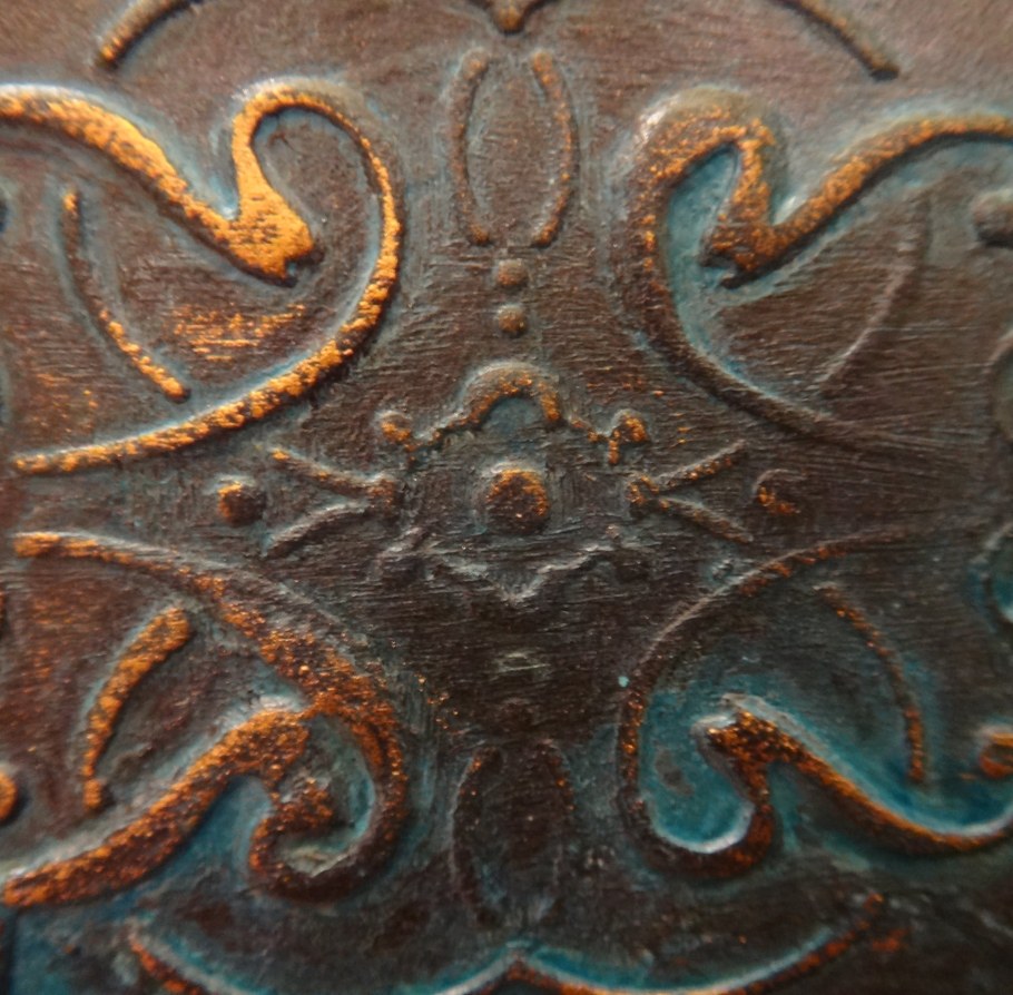 Патина на бронзе на маске