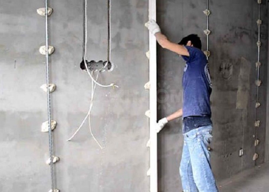 Штукатурка стен по маякам