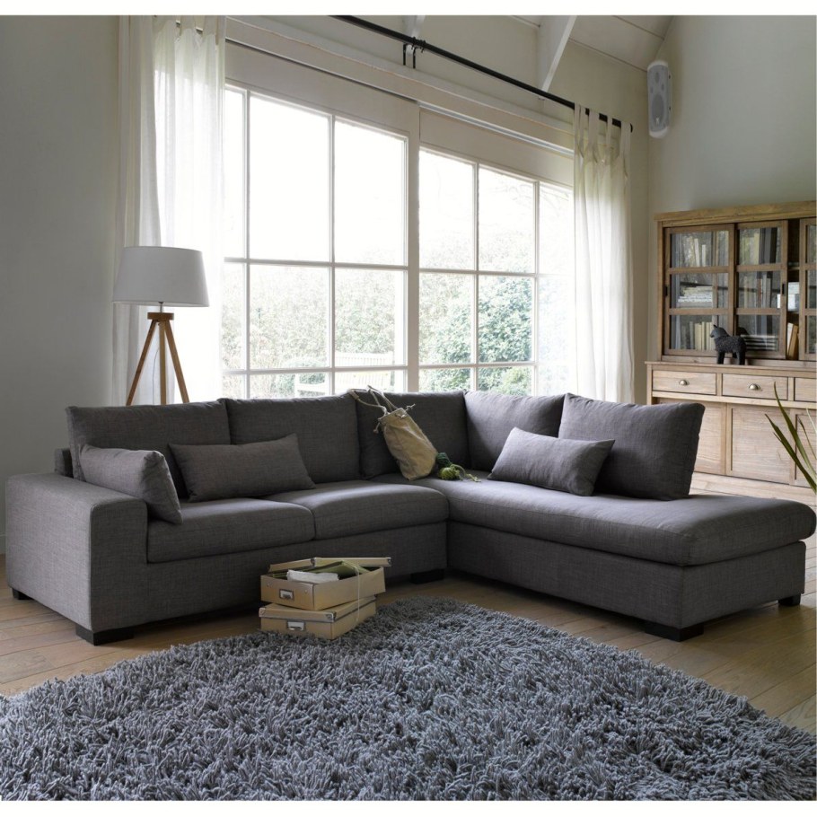 Серый угловой диван в интерьере