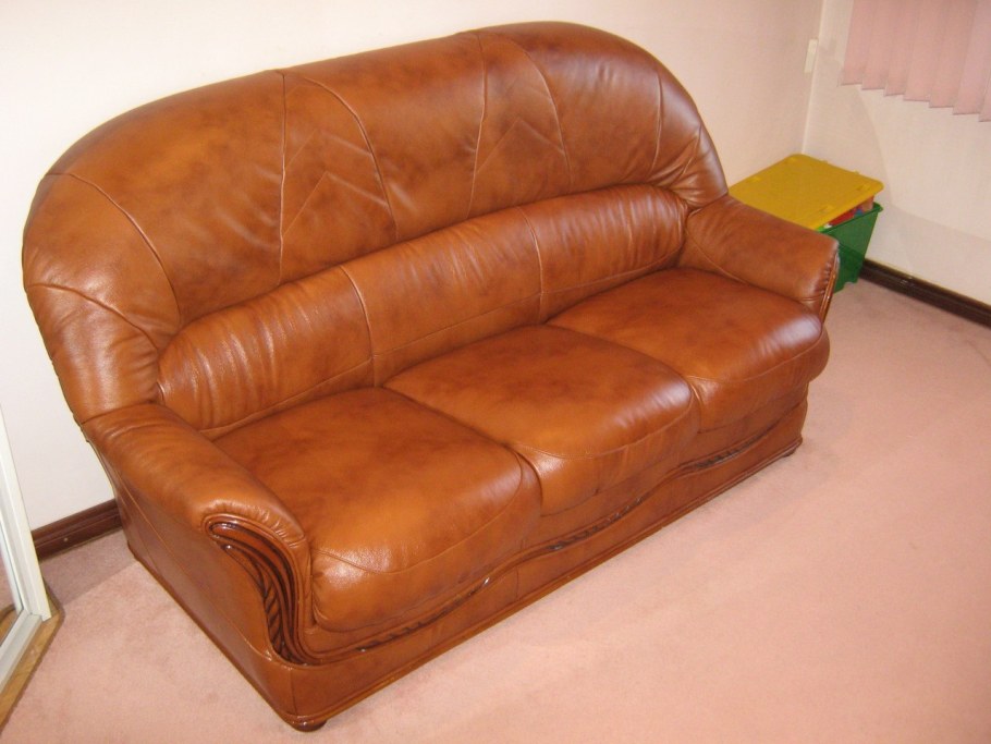 Обтянуть диван тканью