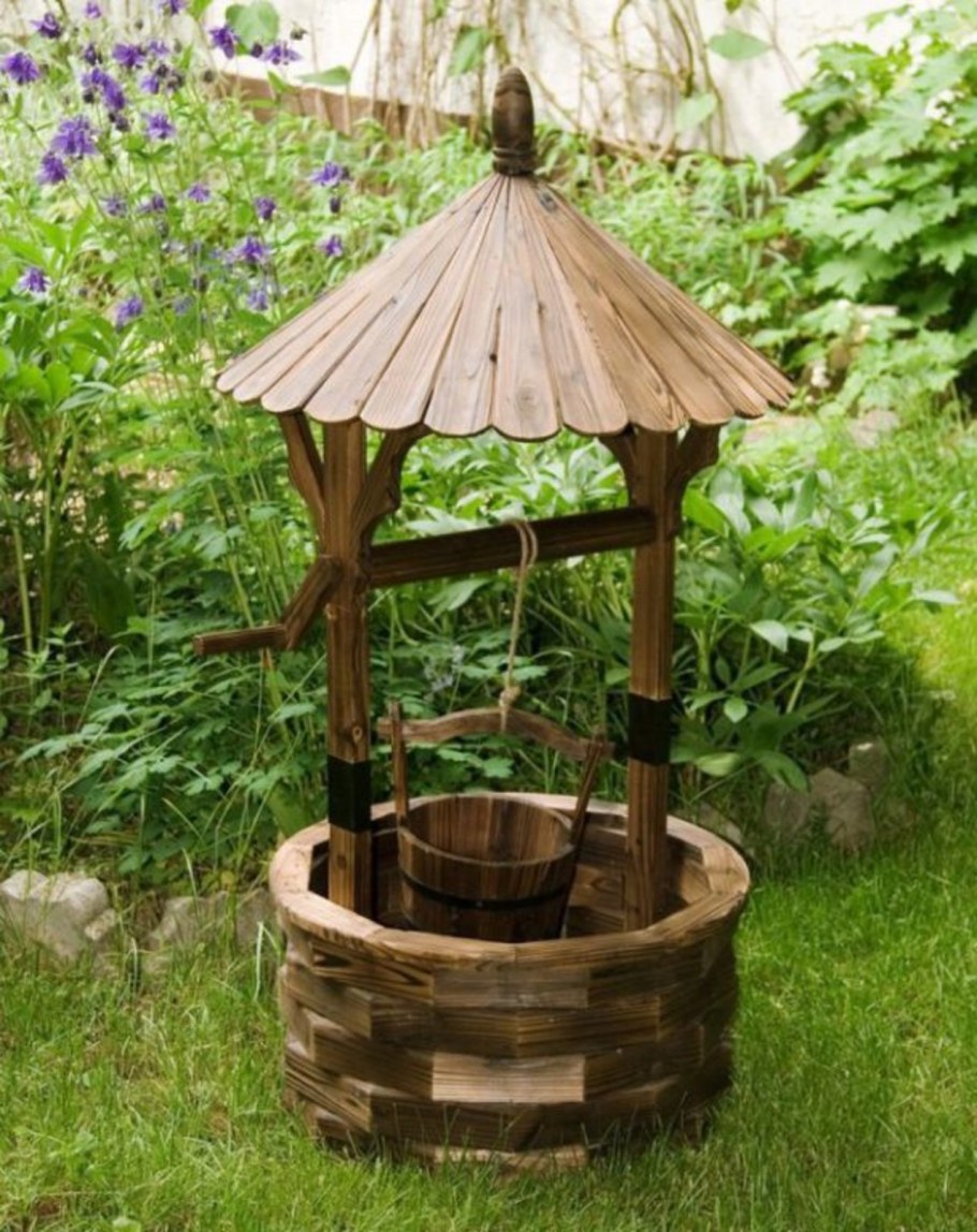 Декор колодца на даче