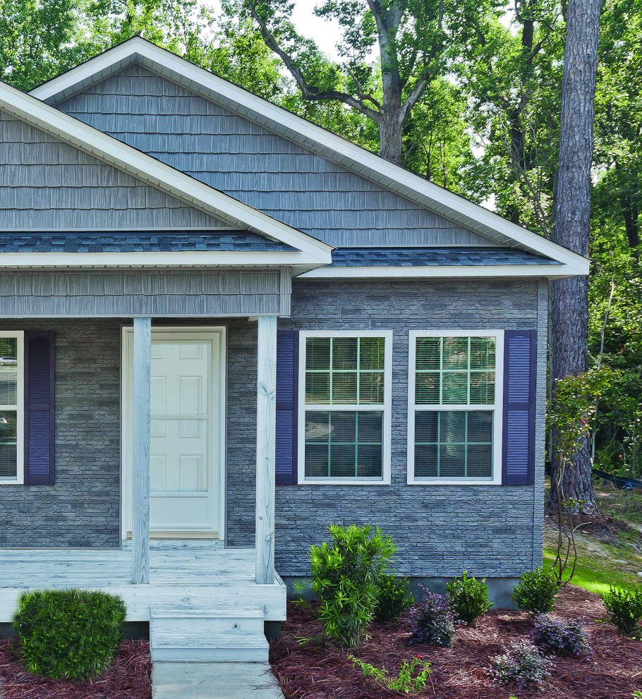 Коричневый каркасный дом