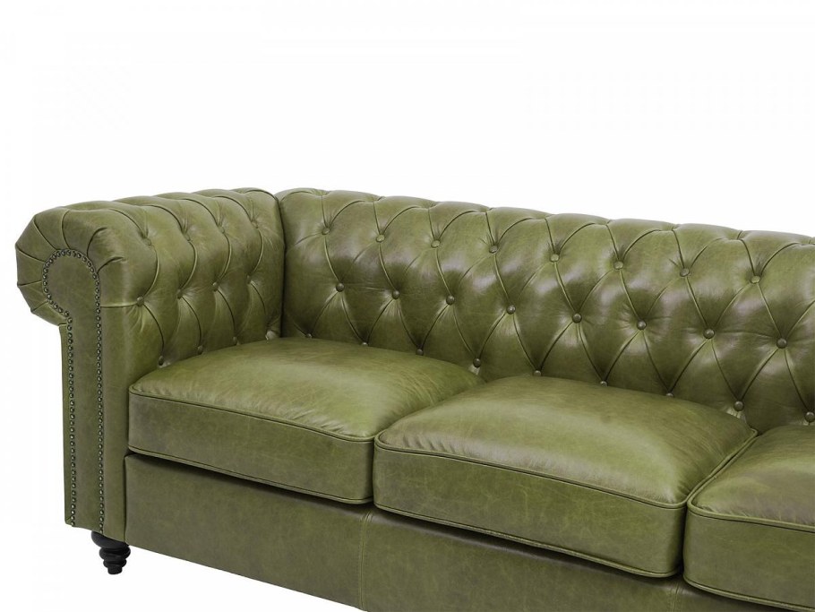 Кожаный диван на ножках для гостиной