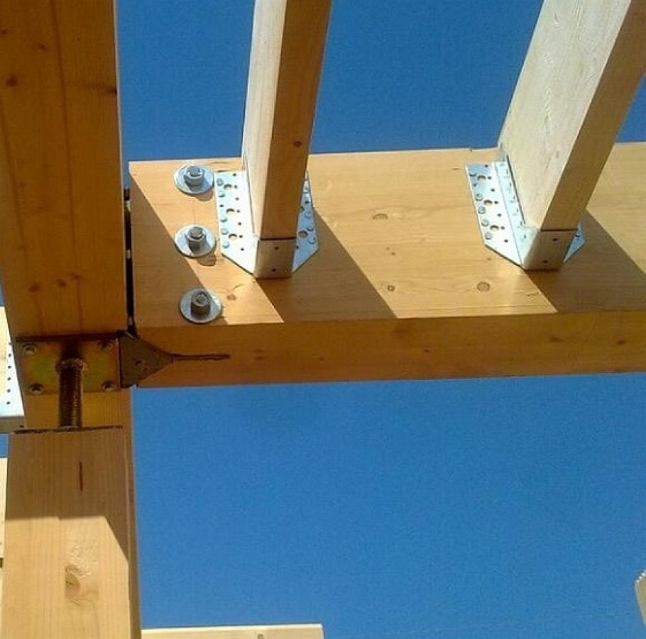 Крепление бруса к свайному фундаменту анкерами