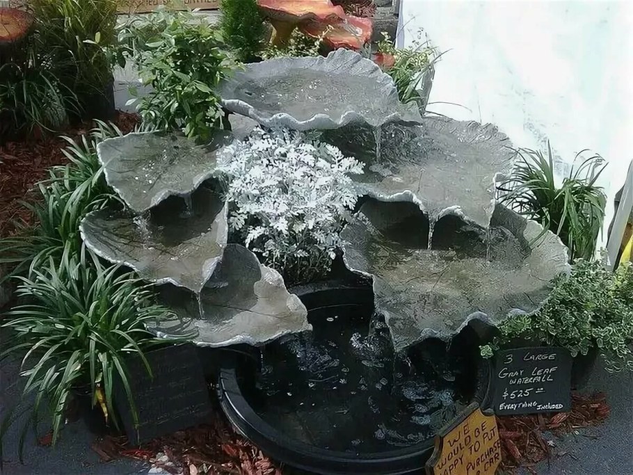 Фонтан из цемента для сада