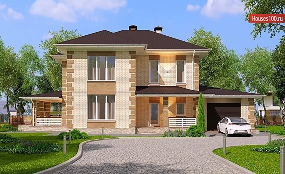Двухэтажный кирпичный дом с гаражом и террасой