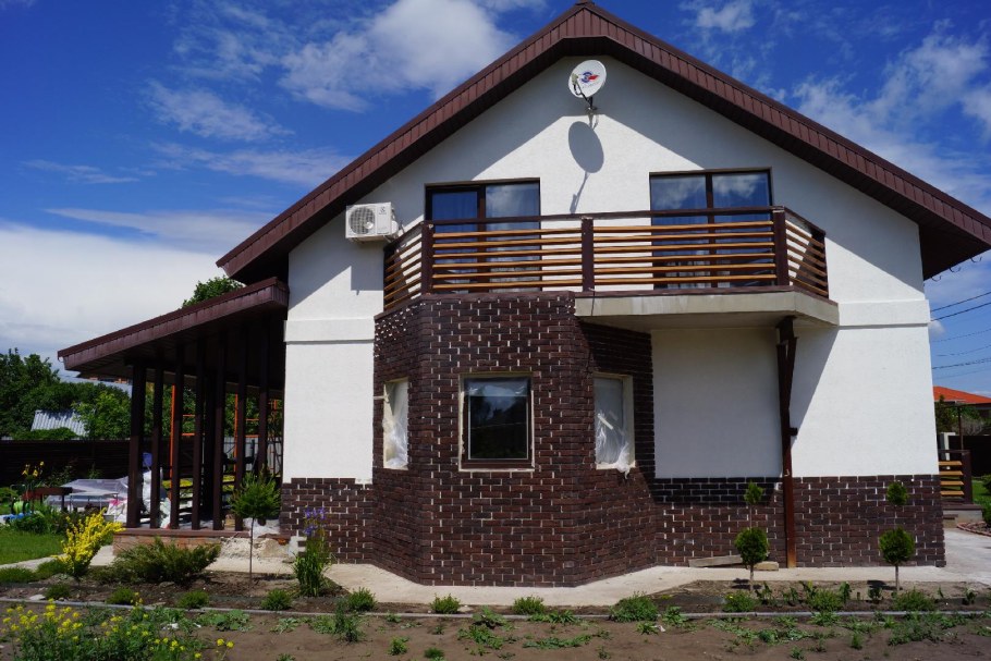 Фасады домов штукатурка