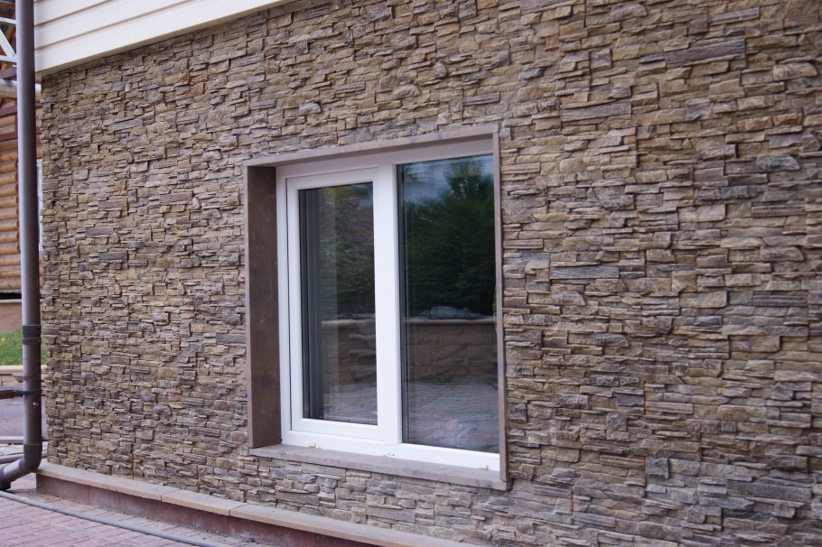 Отделка фасада камнем и штукатуркой