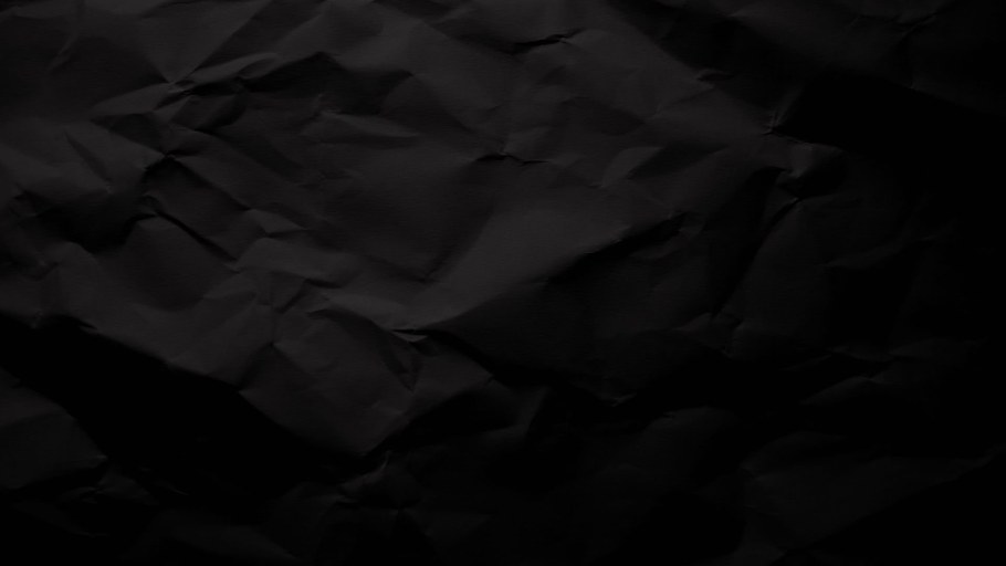Черная мятая бумага фон