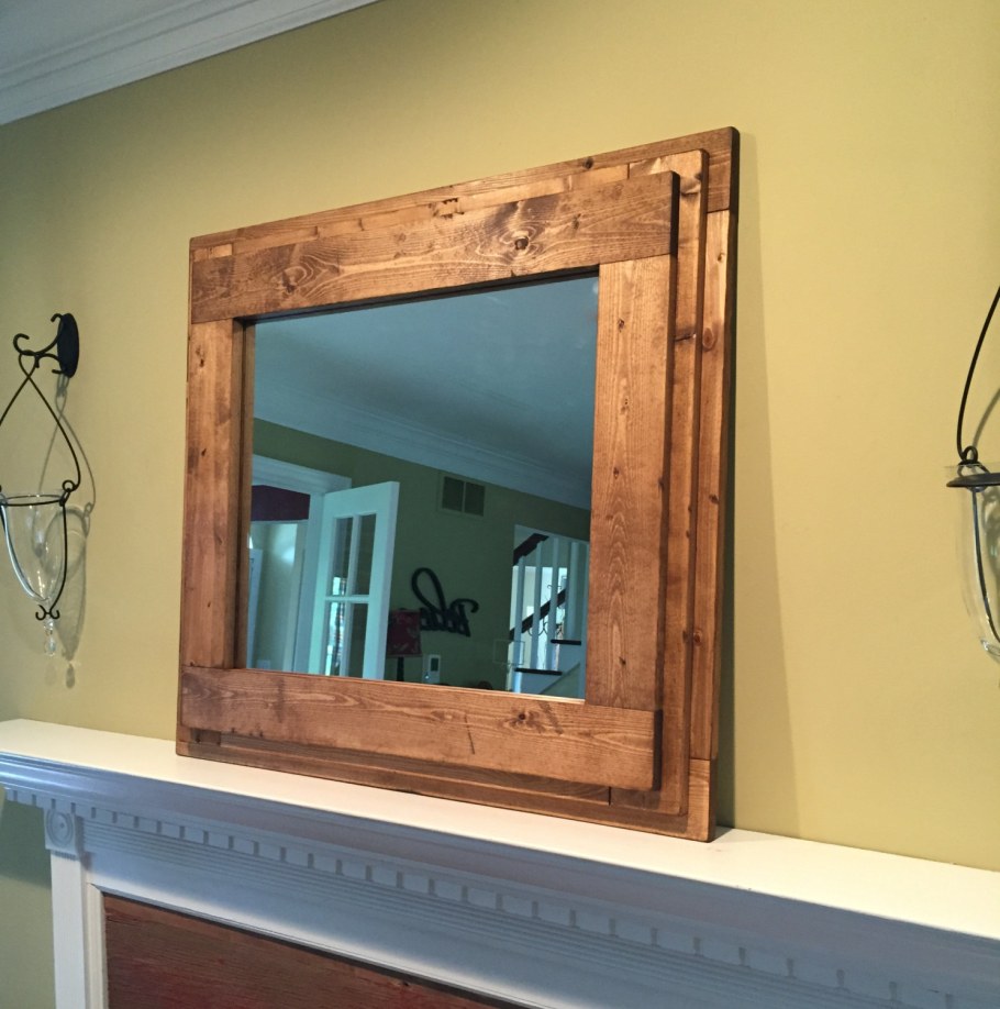 Зеркало с деревянной рамой