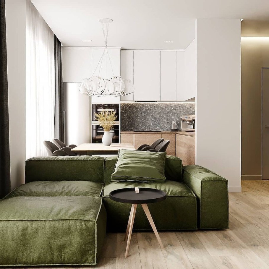 Кухня гостиная с зеленым диваном