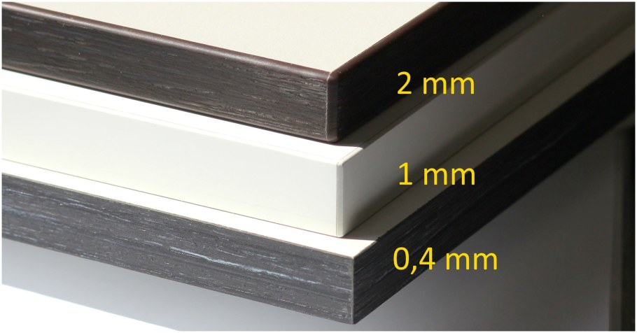 Кромкой АБС (1,2-1,5 мм)