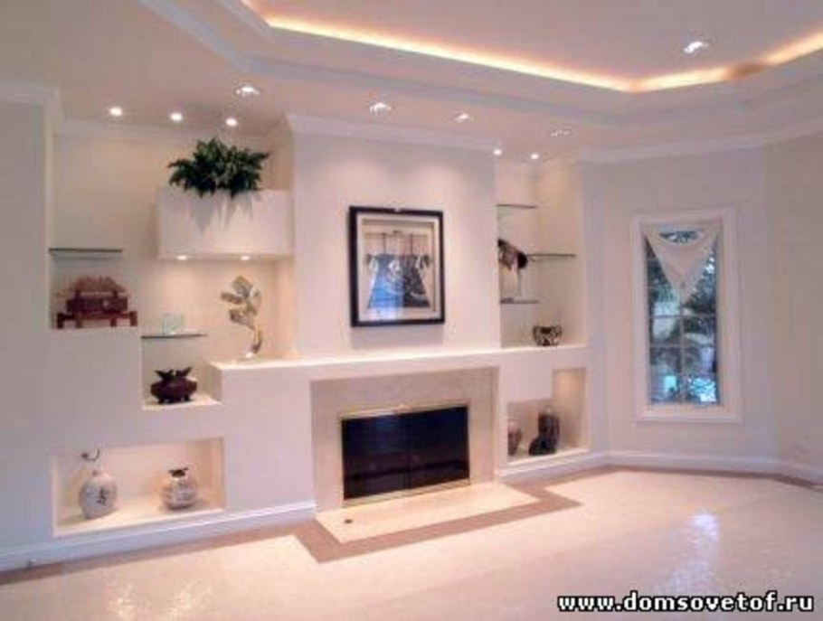 Ниши из гипсокартона с подсветкой с камином