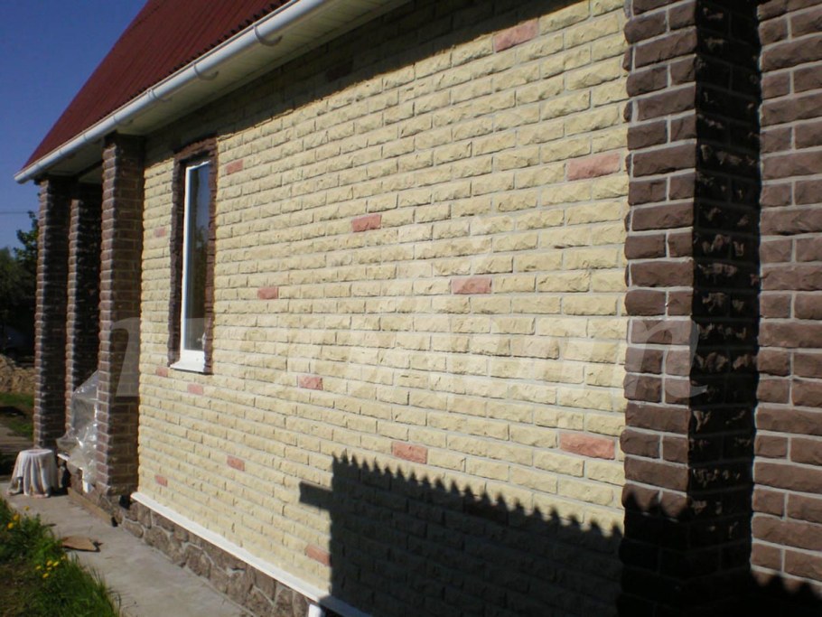 Отделка дома панелями под кирпич