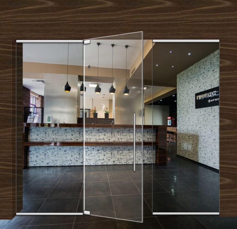 Маятниковые стеклянные двери