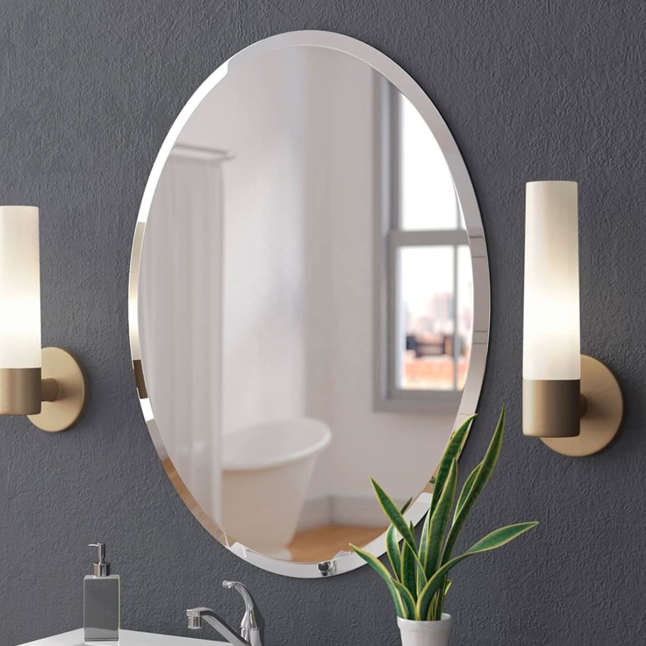 Овальное зеркало в ванную